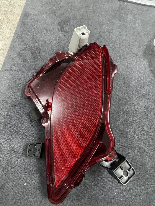 Противотуманная фара задняя на Хайландер