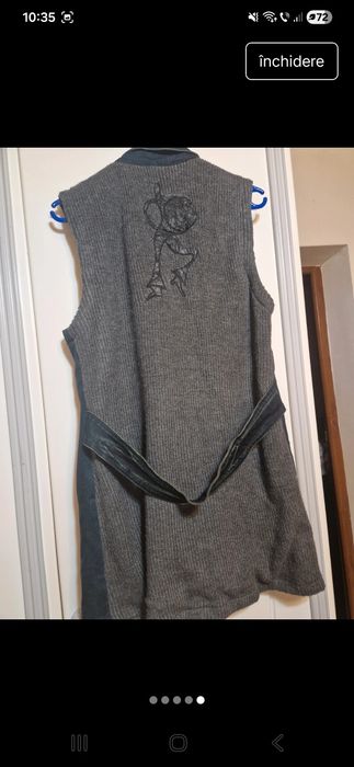 Vesta lunga superbă