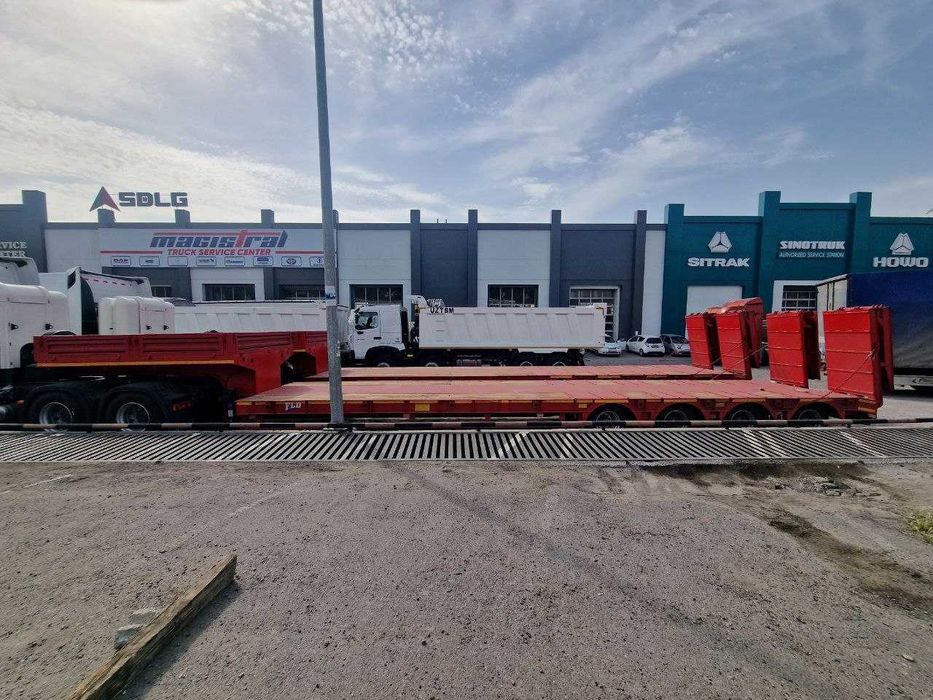 Полуприцеп тяжеловоз низкорамный Feilida - 60 т в НАЛИЧИИ