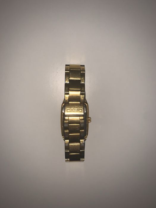 золотые наручные часы Casio MTP-1199.