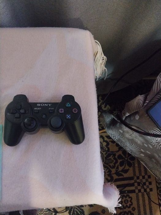 Игровая приставка Playstation 3.