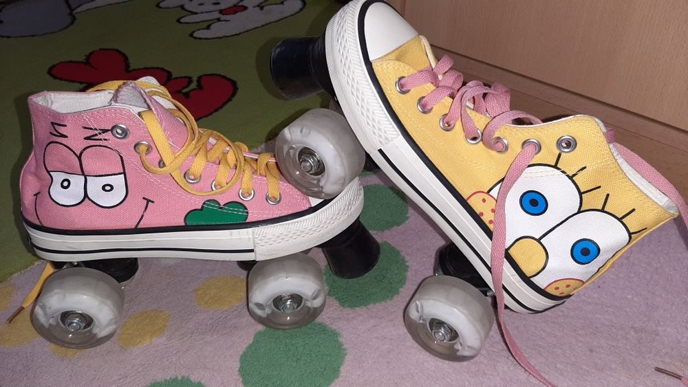 Роликовые коньки