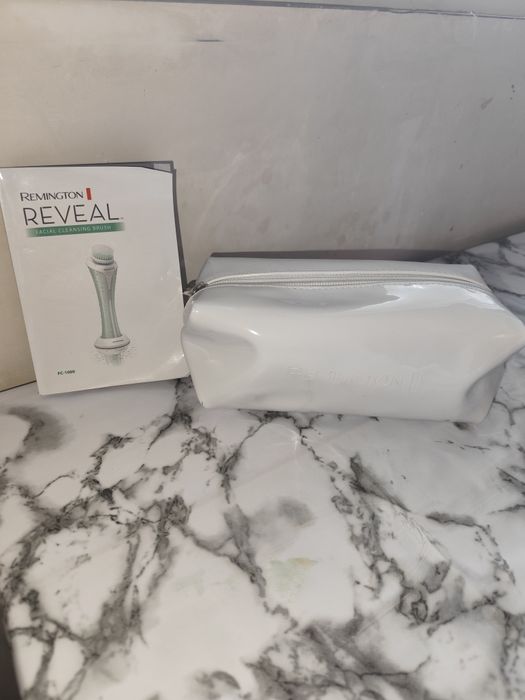 Уред за почистване на лице Remington