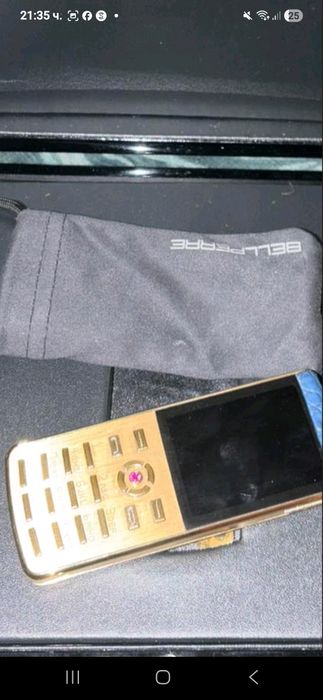 Vertu Signature S – луксозен телефон, злато, сапфир, рубин