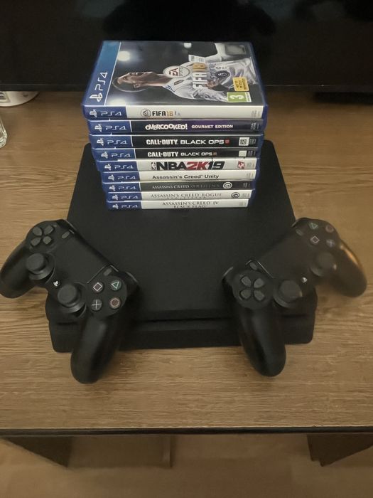 PS4 Slim + 2 manete + 9 jocuri