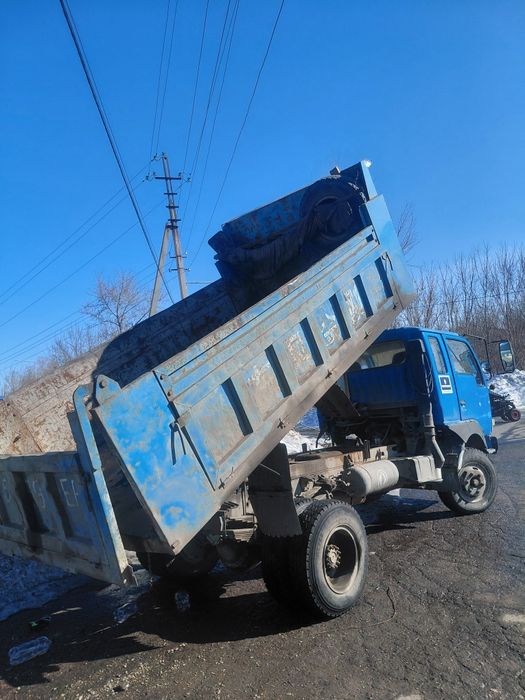 Услуги манипулятора, и самосвала.