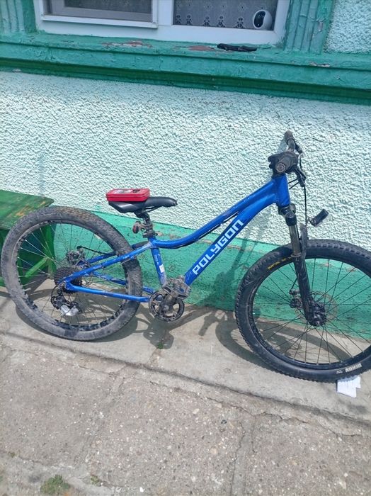 Bicicleta albastră pt copiii întere 7-14 ani