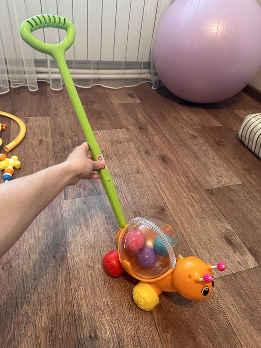 Игрушка-каталка в отличном состоянии