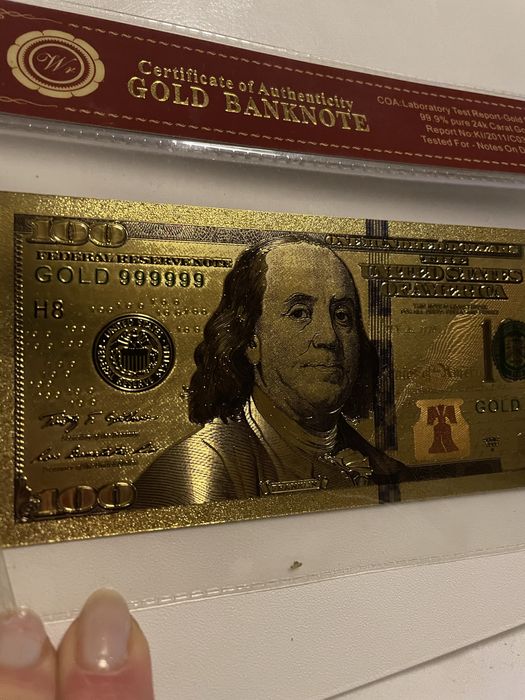Bancnote 100 dolari aurite