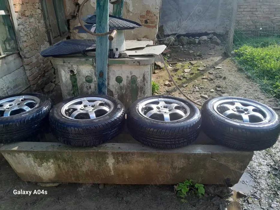 Vând set 4 roti auto de vara 185 69 14
