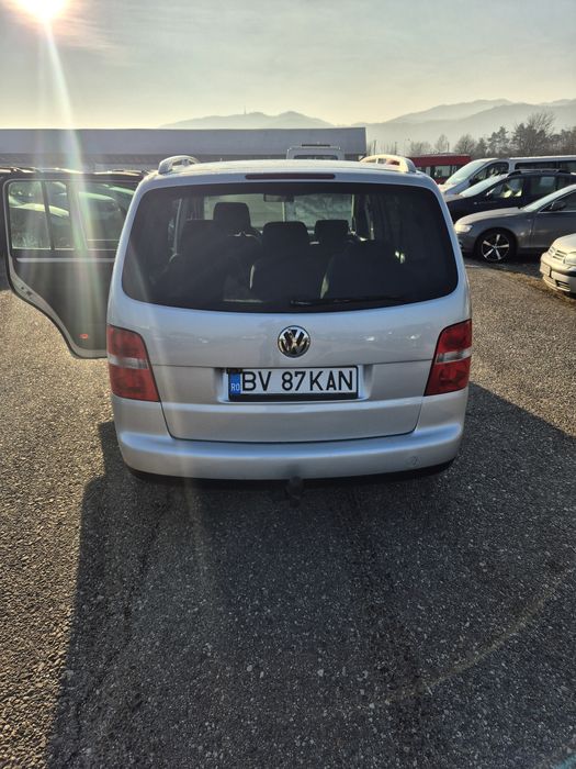 Vand Touran 7 locuri in acte