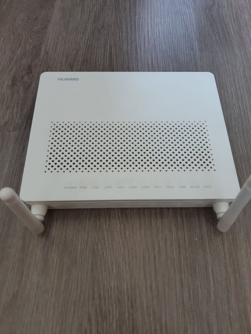 Продам роутер Huawei HG8245 - Периферийные устройства Алматы на Olx