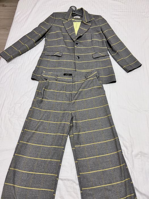 Костюм классика в клетку модный