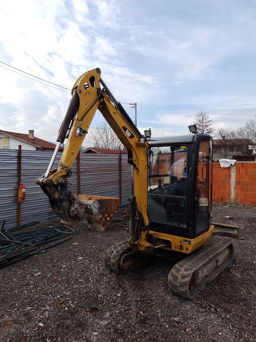 Багер Cat 302.7D