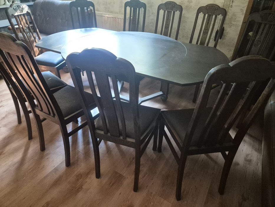 Masa ovala lemn masiv  + 10 scaune lemn masiv si șezut din piele
