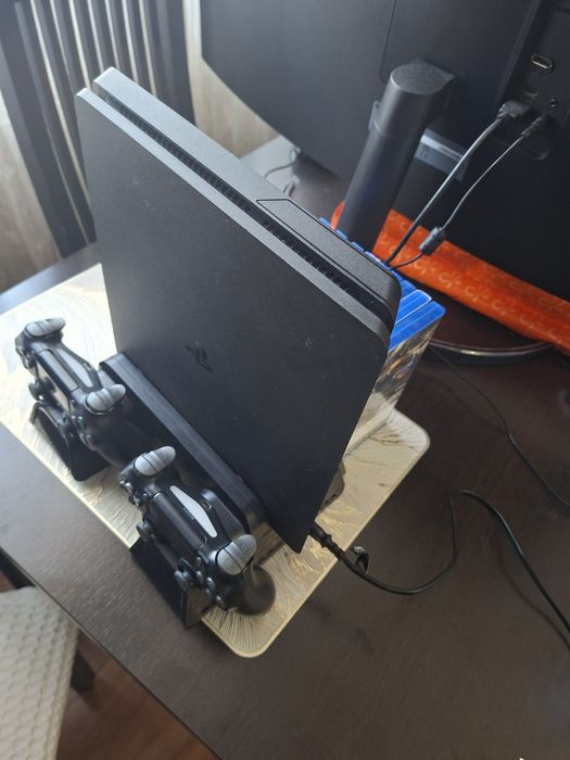 PS4 Slim 1 TB + 2 Controllere Originale + 9 Jocuri | Se vând și separatPS4 Slim 1 TB + 2 Controllere Originale + 9 Jocuri | Se vând și separat