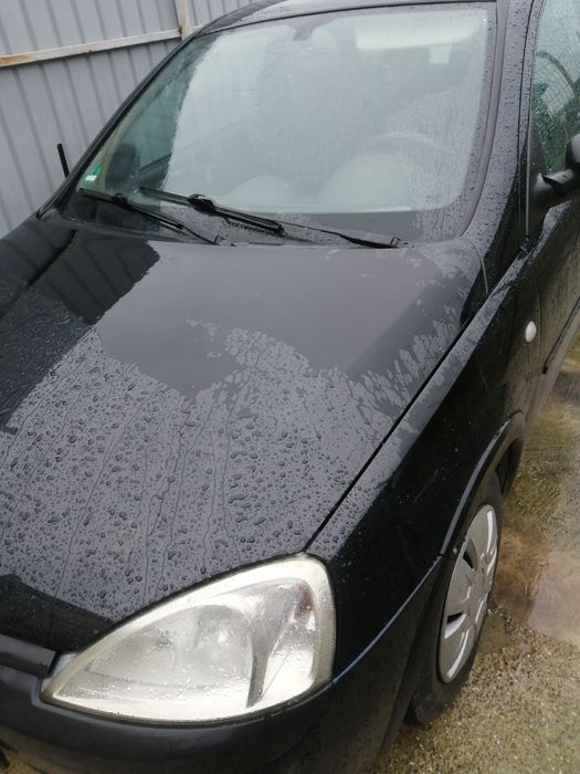 Opel corsa 2004 1.2 benzina, negru,uși .