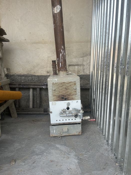 ПЕЧЬ!!!  Можно топить Газом и Углём.