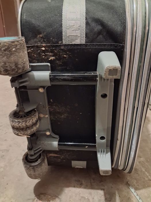 Пътнически куфар с колелца