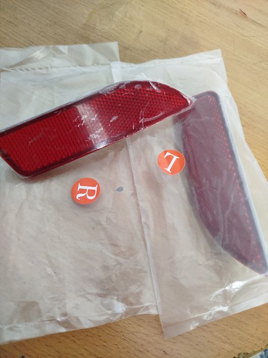 Катафот заднего бампера тойота королла