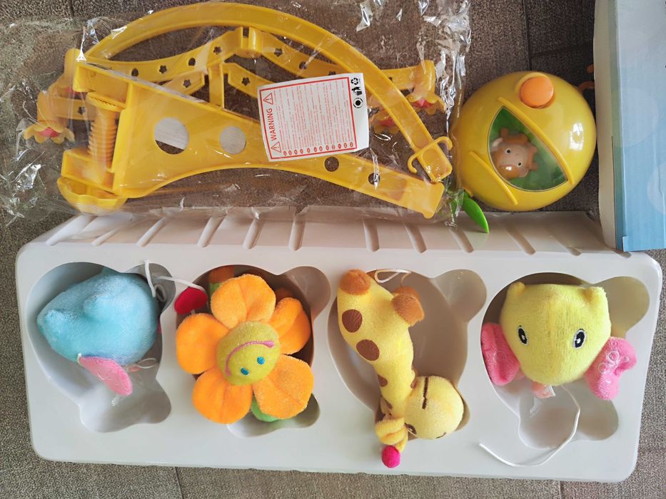 CHIPOLINO Музикална въртележка за легло и кошара ЖИРАФЧЕТА И СЛОНЧЕТА