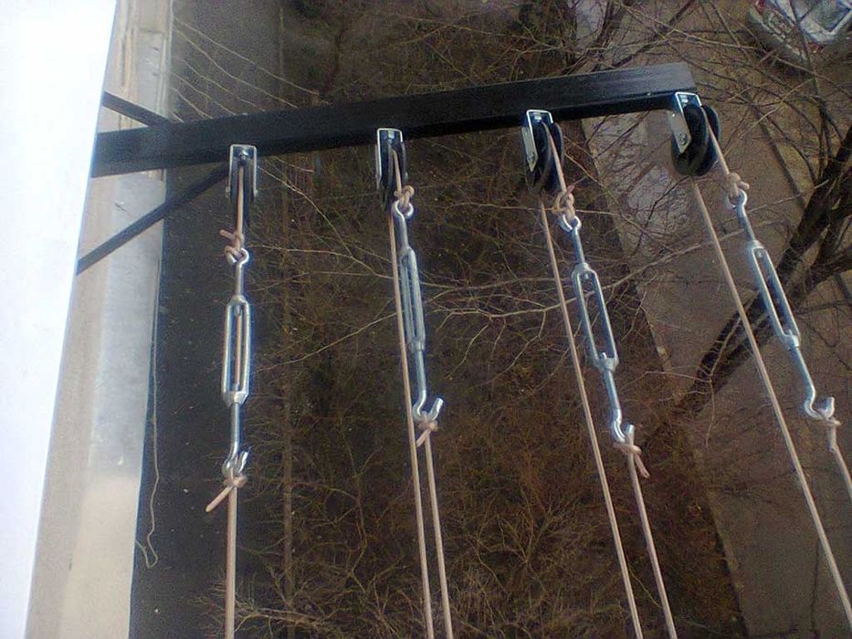 Установка и замена бельевых роликов и кронштейнов (сушилок) для белья