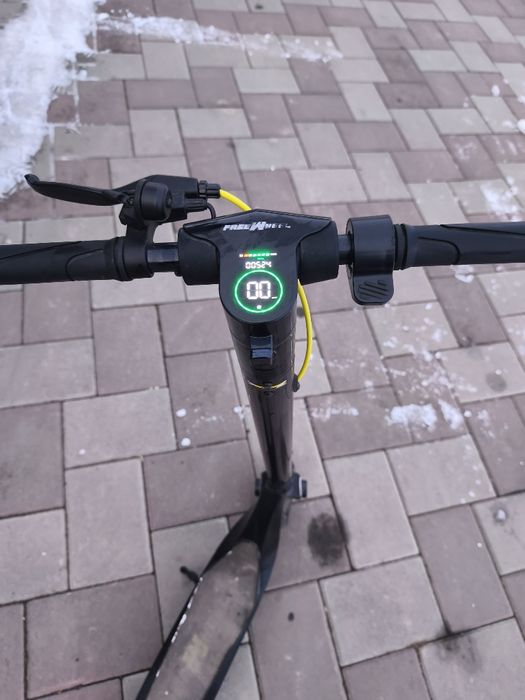 Trotinetă freewheel