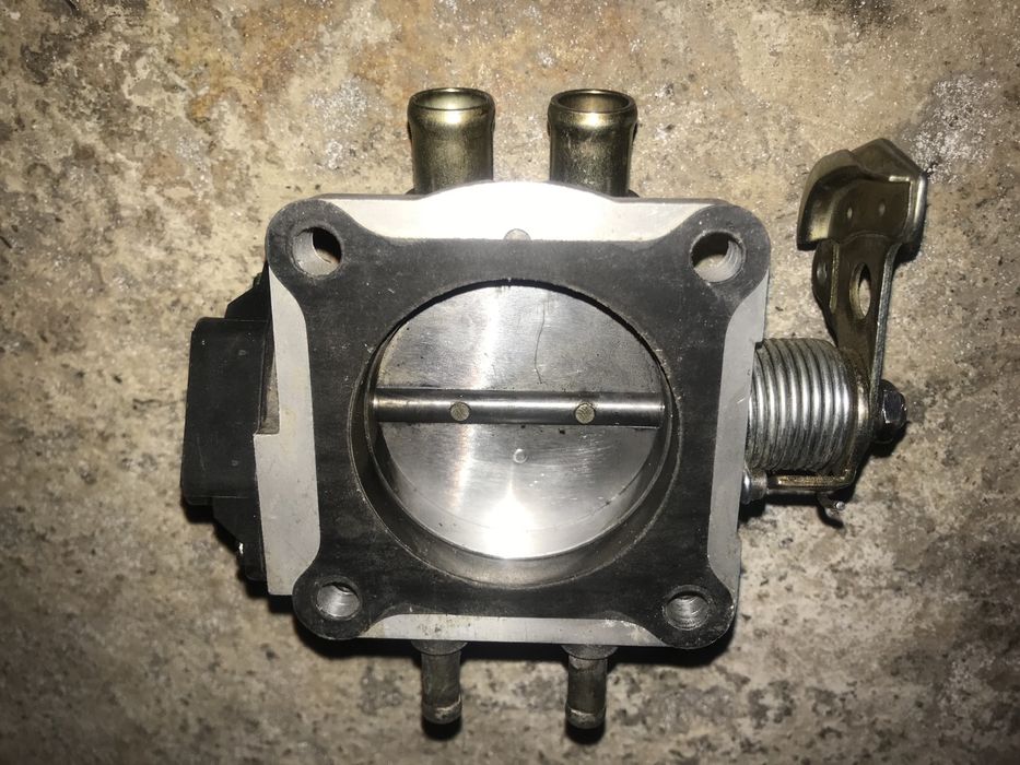 Дроссельная заслонка Новая для Волги газ