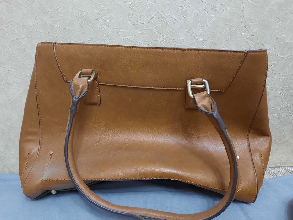 Женские сумки и мягкие игрушки