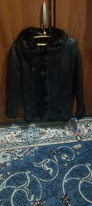 Продам дубленку черного цвета размер 54