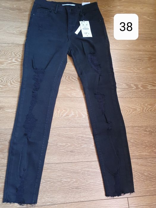 Blugi negri noi cu eticheta dama 38