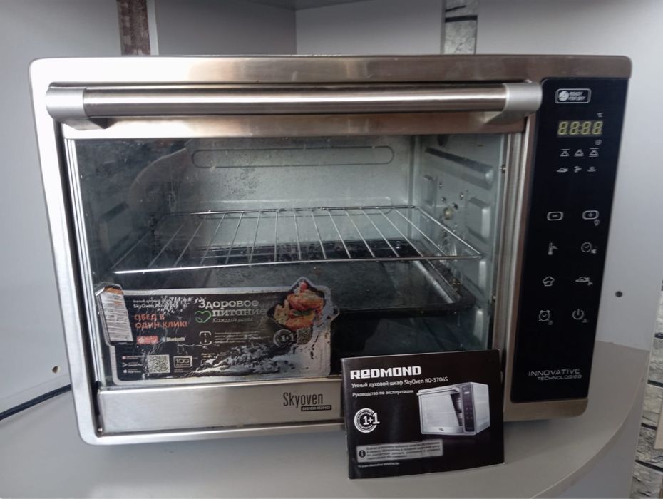 Духовой шкаф Redmond