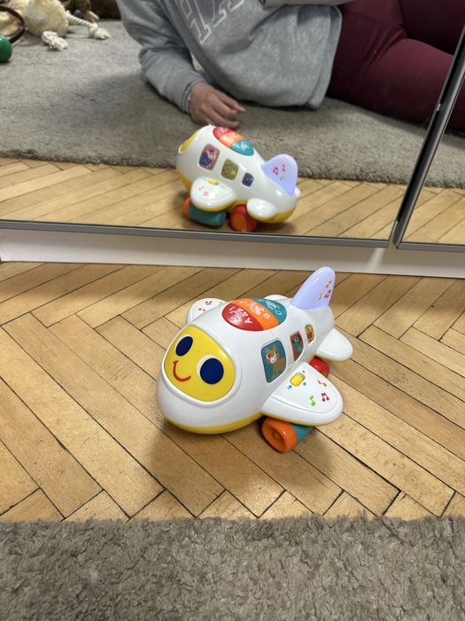 Jucarie interactiva bebe - Avion cu muzica si lumini in limba engleza