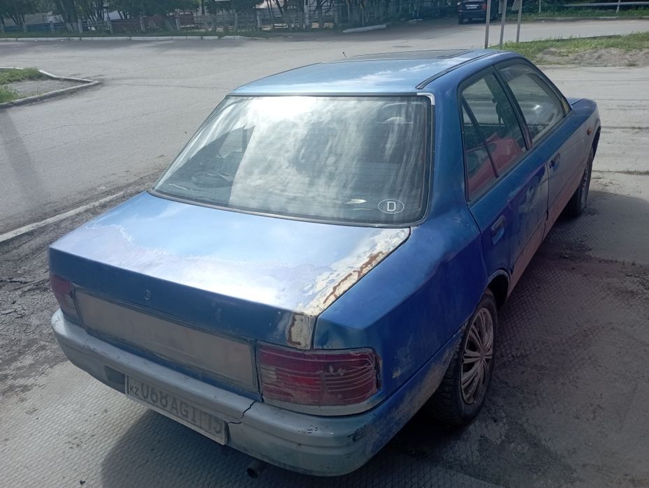 Мазда 230000 тенге