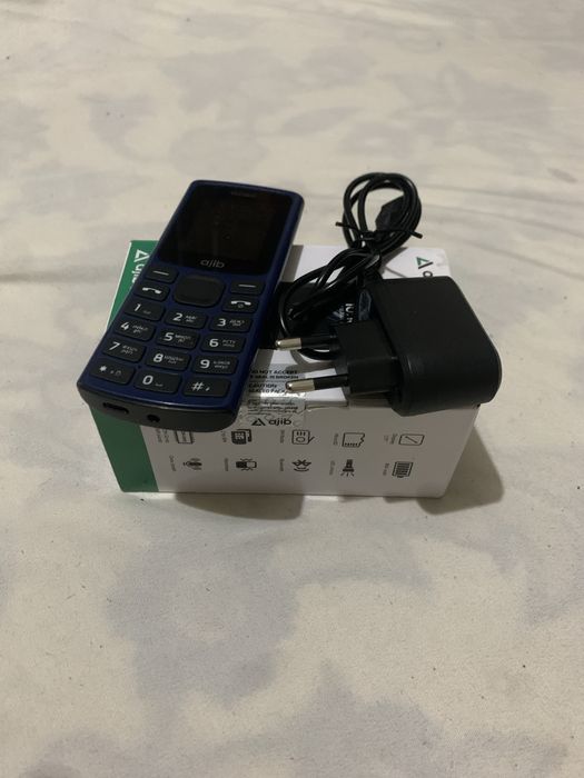 Knopkali telefon Ajib
