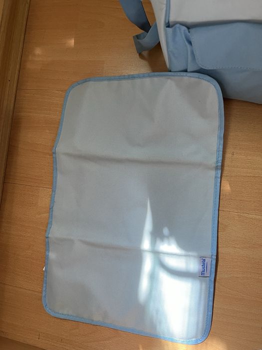 Органайзер за бебешка количка на Mustela с включена постелка