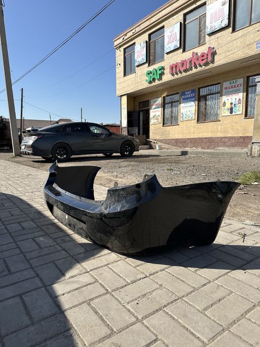 Задний бампер на гранту новый