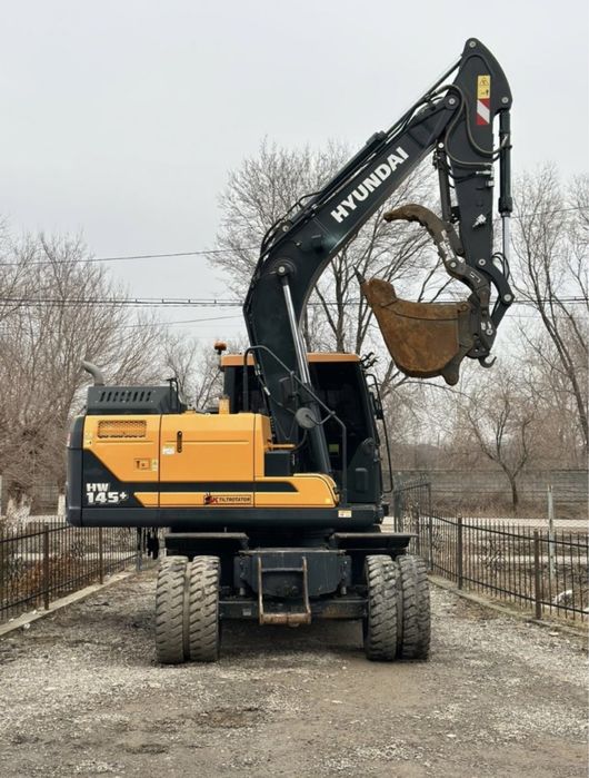 Услуги колёсного эксковатр