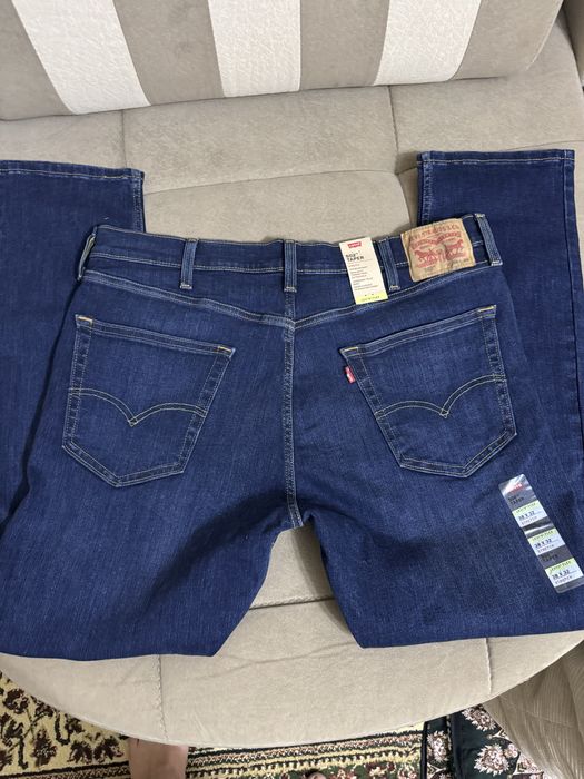 Мужская оригинал джинсы Levis (38/32) 502 TAPER STRETCH