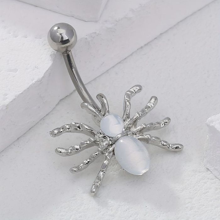 Пирсинг в пупок.