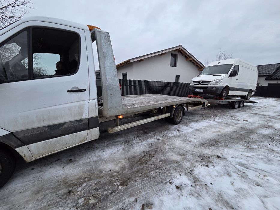 Tractari auto, transport utilaje si marfuri pe platforma