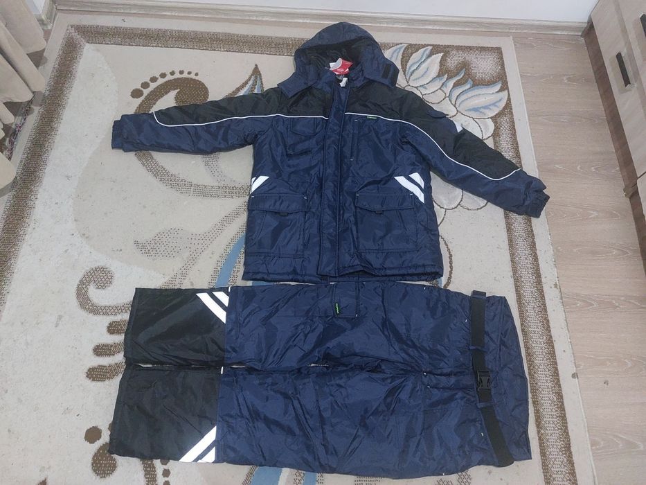 Зимний комбинезон новый