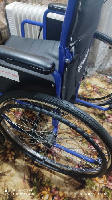 Инвалидная коляска