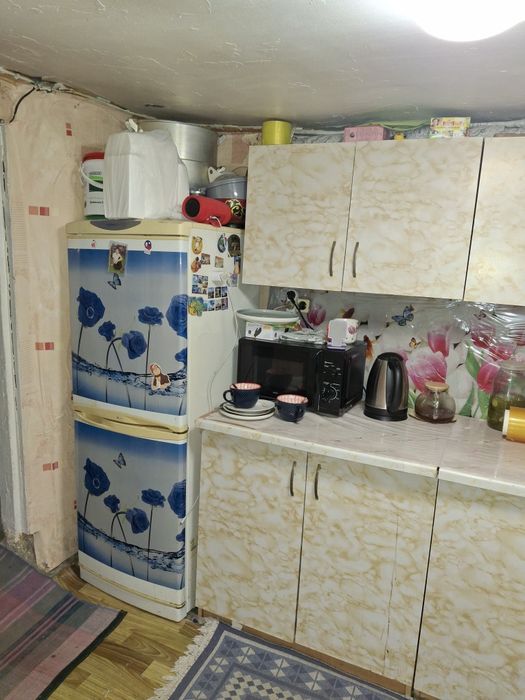 Продам земельный участок  старым домом