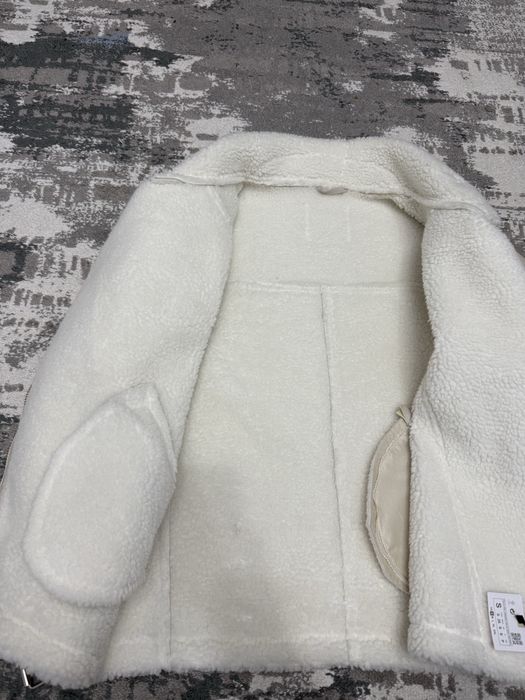 Продам дубленку белого цвета
