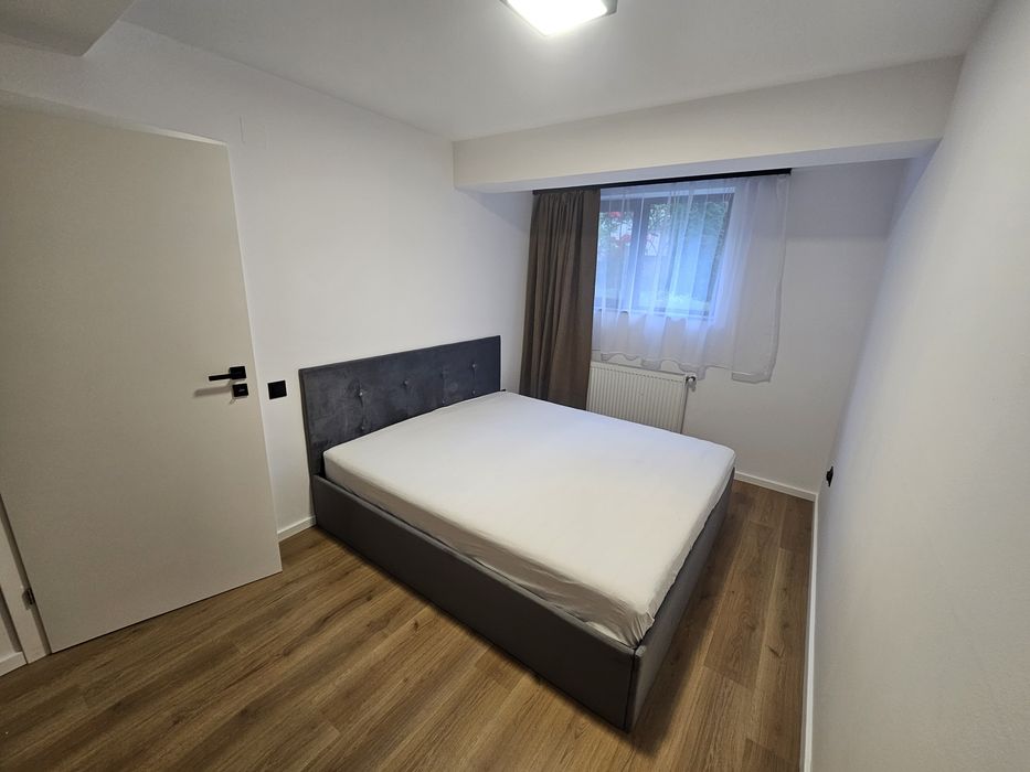 Apartament cu 2 camere Demisol  + parcare cu CF, zona Buna Ziua