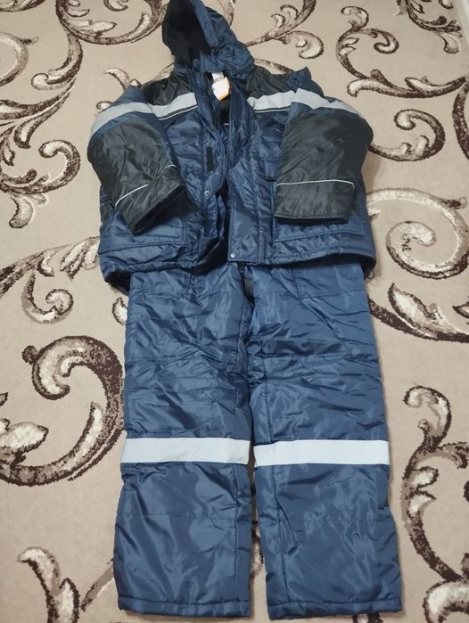Продам новые комбинезоны зимние
