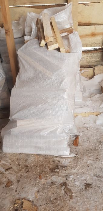 Дрова в мешках 1200тг