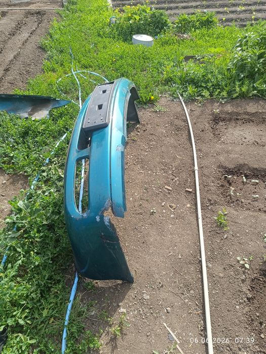 Продам передний бампер на Мазду кронос