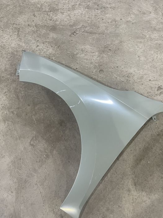 Skoda rapid крыло левое